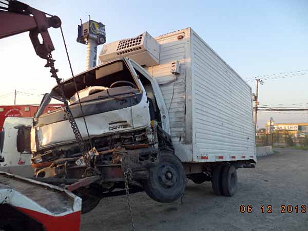 Foco Mitsubishi CANTER  USADO