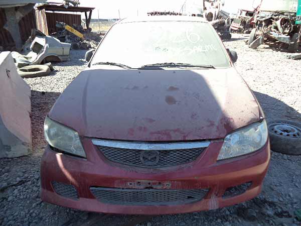 TAPABARRO Mazda 323 2000  USADO EN DESARME